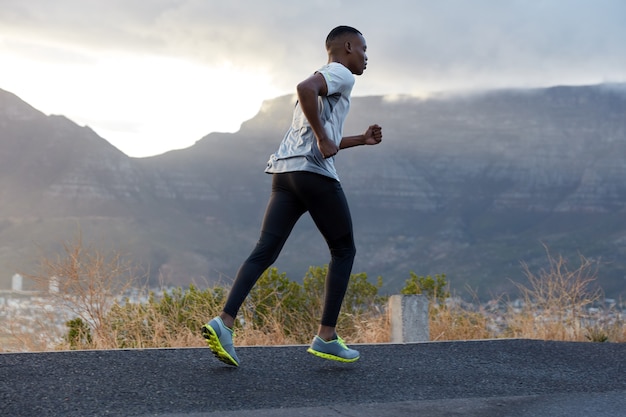 Free Photo | Running young man in sportswear, does jogging exercise ...