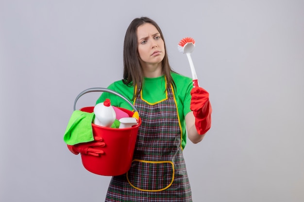 Free Photo | Sad cleaning young girl wearing uniform in red gloves ...