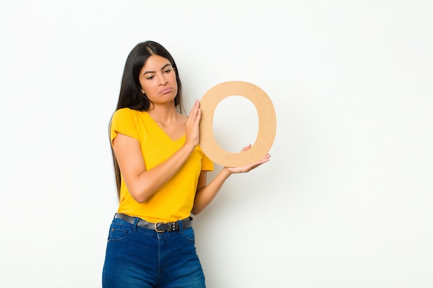 premium-photo-sad-depressed-unhappy-holding-the-letter-o-of-the