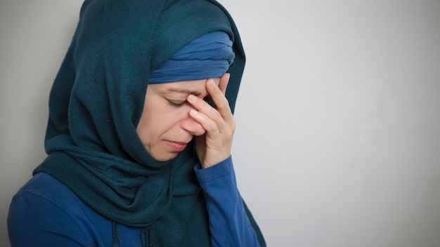 Premium Photo | A sad muslim woman in a hijab, crying.