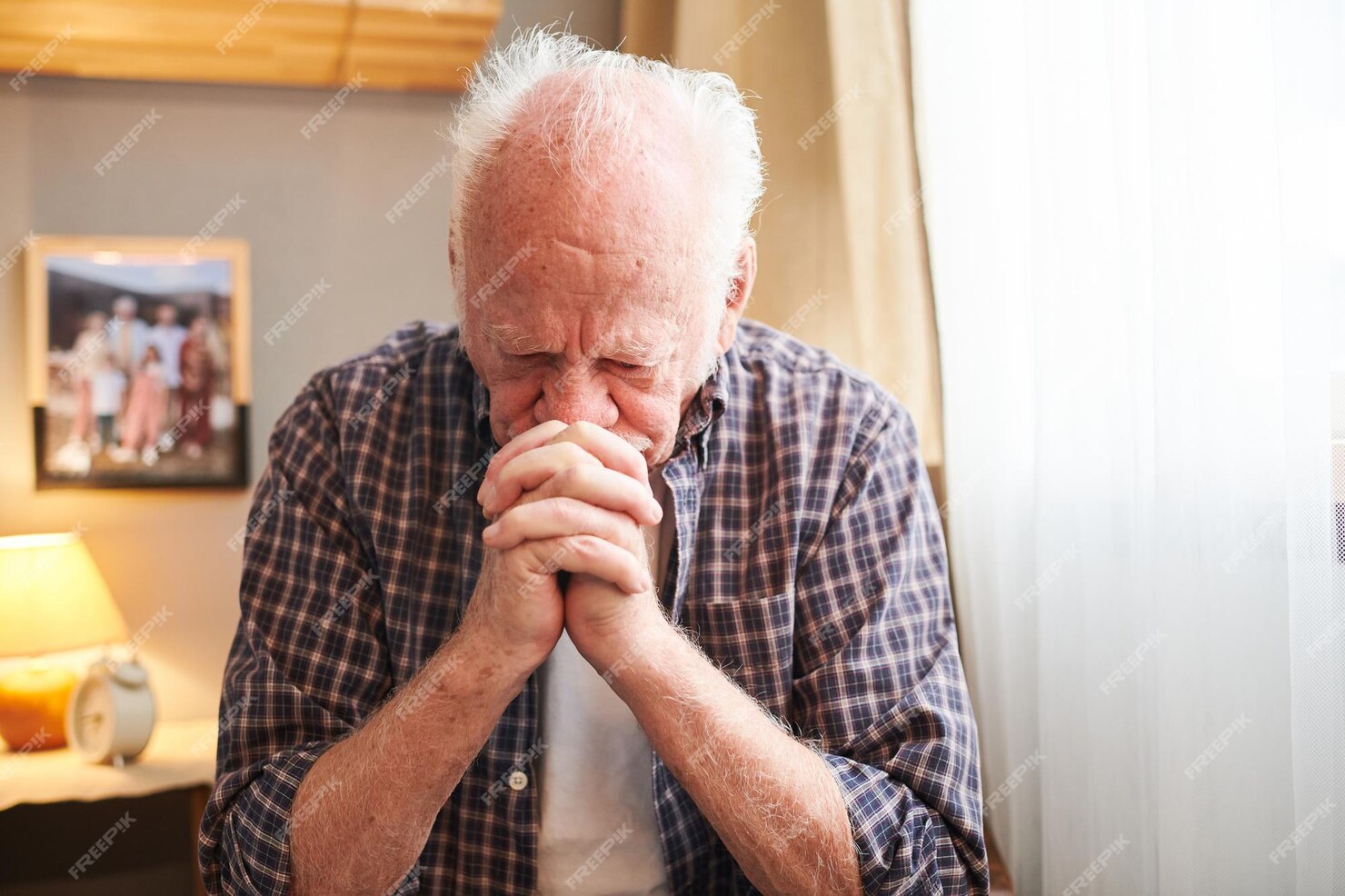 Premium Photo | Sad old man sitting in his room