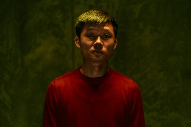 Premium Photo | Sad and tired asian man dark portrait