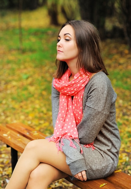 Premium Photo | Sad woman portrait sitting on a bench.