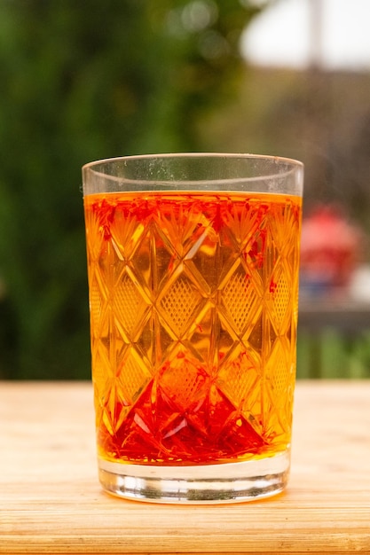 Premium Photo Saffron diluted in hot water in a glass