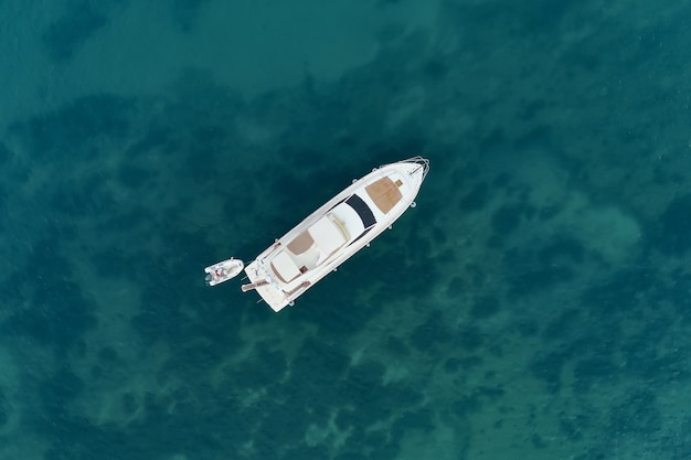 Sailboat in the sea in the evening sunlight over beautiful sea, luxury summer adventure, active vacation in mediterranean sea, turkey Free Photo