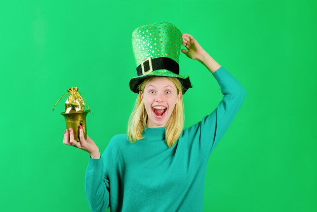 Premium Photo Saint Patricks Day Green Top Hat St Patricks Day Woman In Top Hat Holds Pot With 