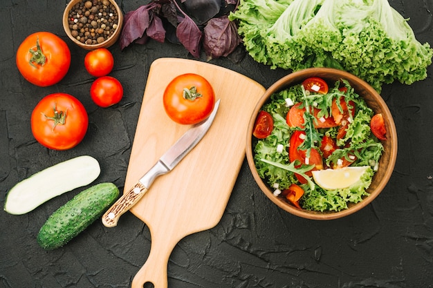 Free Photo | Salad and cutting board