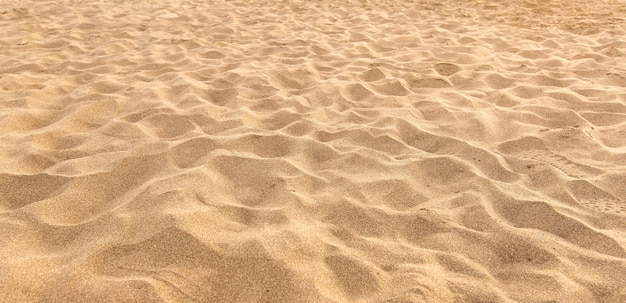 Premium Photo | Sand on the beach as background
