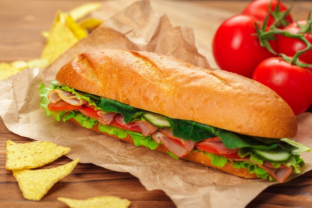 Premium Photo | Sandwich on a wooden table