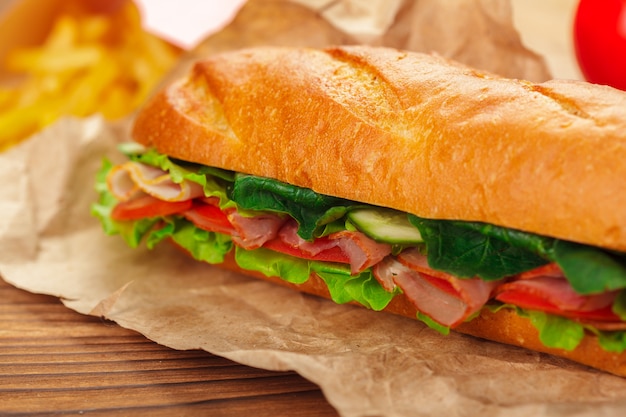 Premium Photo | Sandwich on a wooden table