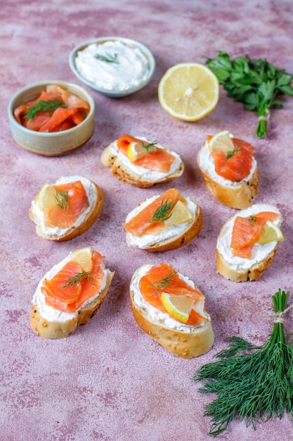 Free Photo | Sandwiches with smoked salmon and cream cheese and dill.