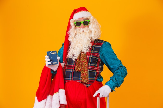 Premium Photo | Santa claus holding the brazilian passport