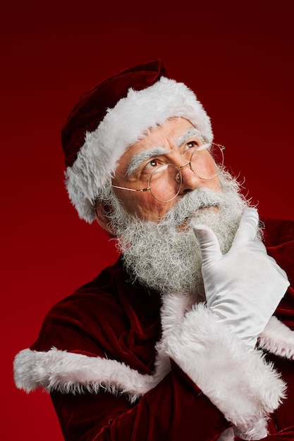 Premium Photo | Santa claus thinking