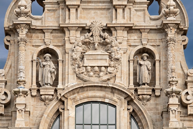 Premium Photo Santiago De Compostela Cathedral Facade Detail With Two Sculptures Of Saint James And The Tomb