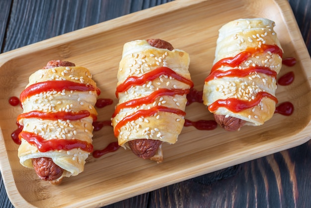 Sausage Rolls On The Wooden Tray Premium Photo