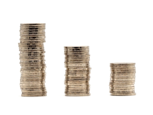 Saving money concept with money coin stack isolated on white background. Premium Photo
