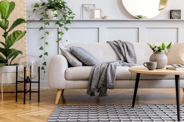 Premium Photo Scandinavian Concept Of Living Room Interior With Design Sofa Coffee Table Plant In Pot Flowers Carpet Plaid Pillow Shelf Decoration And Personal Accessories In Modern Home Staging