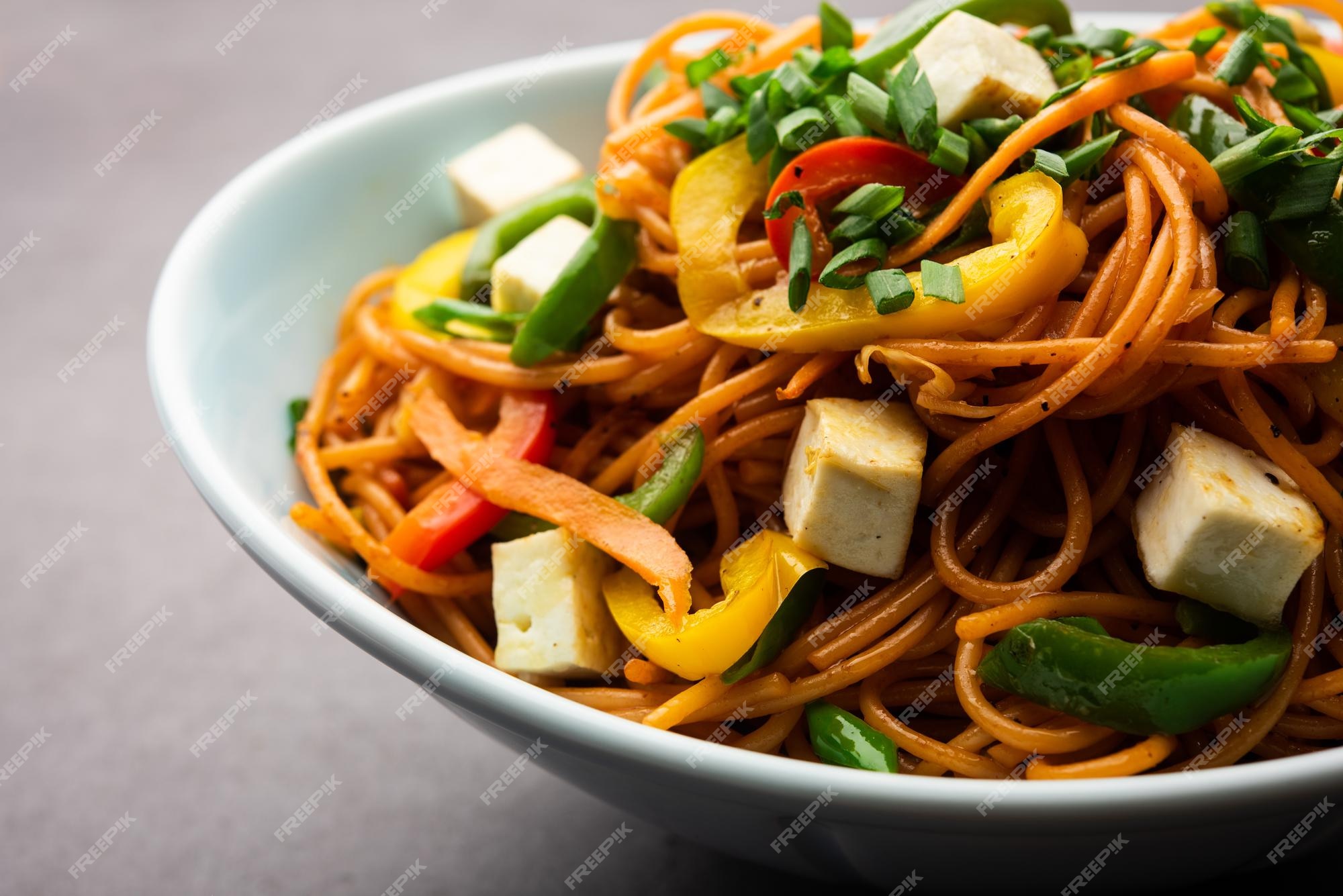 Free Photo | Schezwan or szechwan hakka noodles with paneer or cottage ...