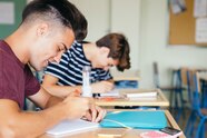 Free Photo Schoolmates Leaning And Smiling