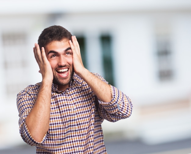 Free Photo | Screaming arab on the urban blurred background