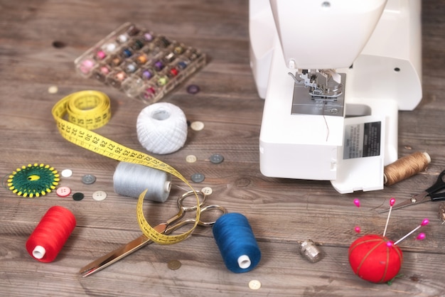 Premium Photo | Seamstress or tailor background with sewing tools ...