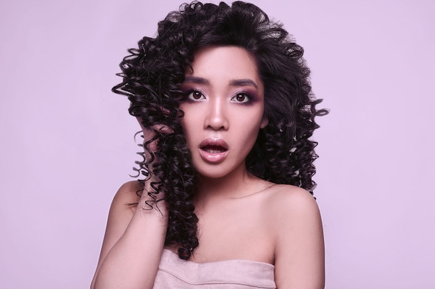 Sensual Beautiful Asian Girl With Curly Hairstyle Photo Premium