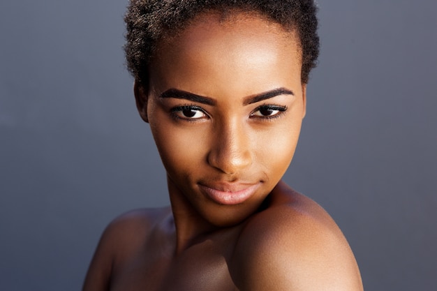 Premium Photo | Sensual young african woman against gray background