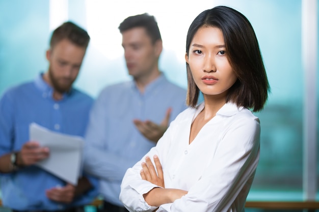 Free Photo | Serious confident asian lady boss crossing arms