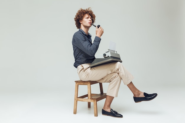 Serious thinking retro man dressed in shirt Free Photo