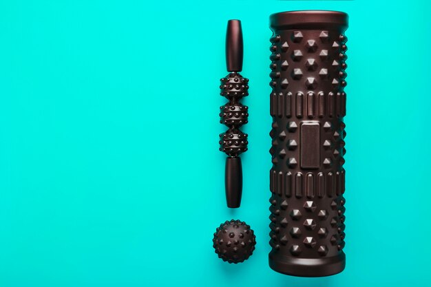 Premium Photo Set Of Black Bumpy Foam Massage Rollers Body Rollers And Rubber Balls 