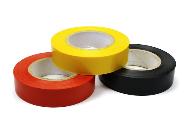 Premium Photo | Set of colored insulating tape on white