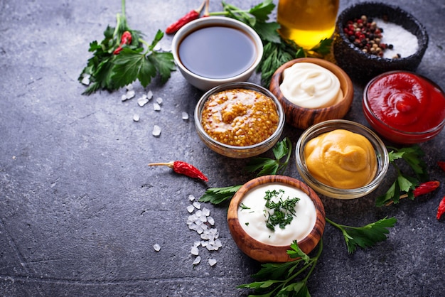 Set of different sauces and spices | Premium Photo