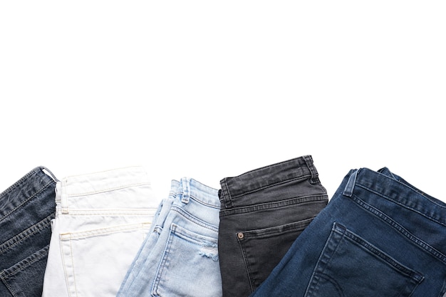 Premium Photo | A set of folded jeans isolated , flat lay.