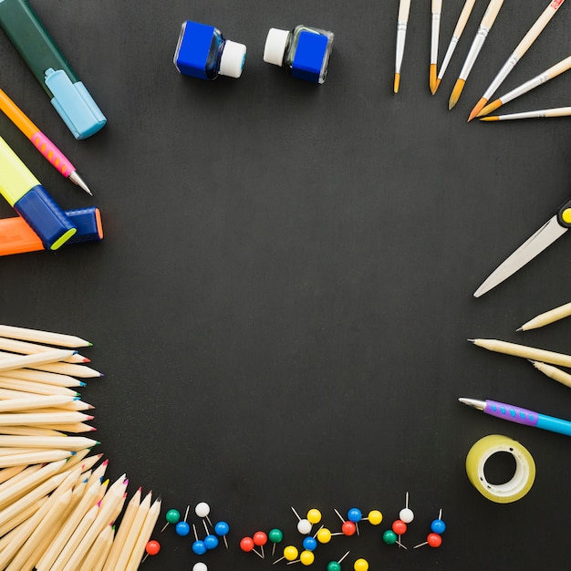 free-photo-set-of-school-materials-on-black-desk