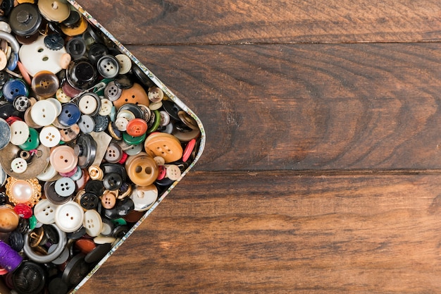 Premium Photo | Sewing buttons in a box