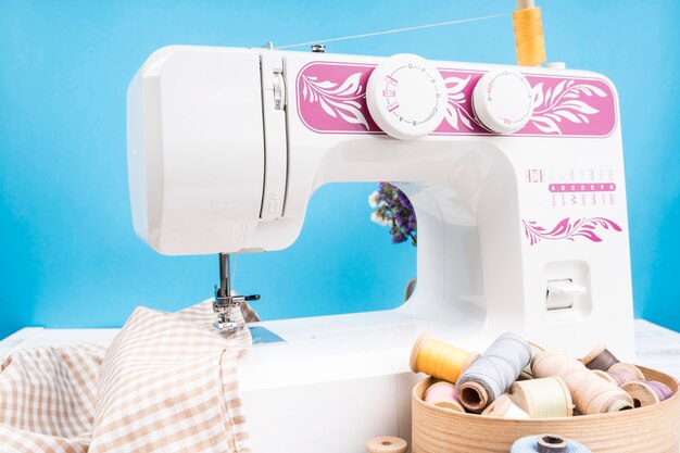 Premium Photo | Sewing machine with patterned cloth