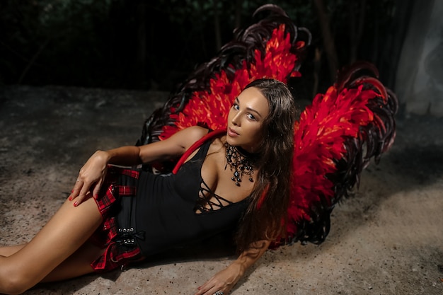 Premium Photo | Sexy devil concept. demon sexy girl with long hair. girl sexy  demon with wings, devil full of desire. woman on passionate face play role  game. lady sexy dressed as