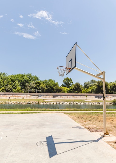 Free Photo | Shadow of an empty basketball hoop at outdoors court