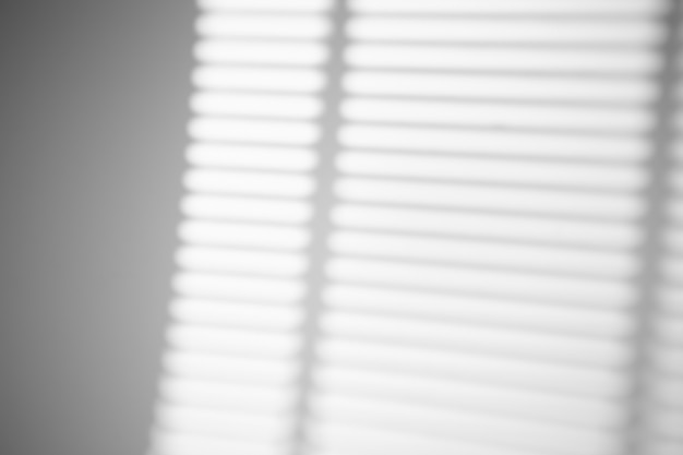 Premium Photo | The shadowfrom the blinds of the window on a white wall