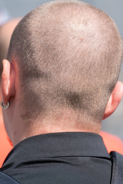 Premium Photo A Shaved Man On The Back Of His Head The Round Head Of An Adult Male From Behind