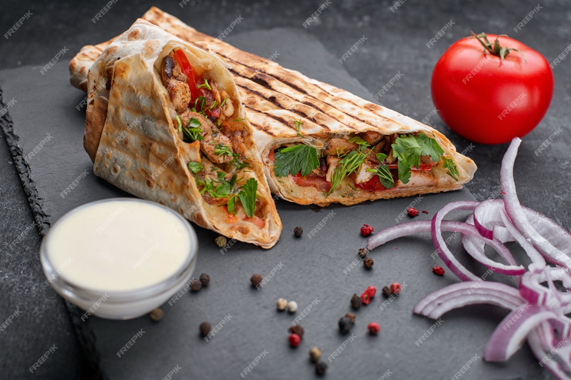 Premium Photo | Shawarma with meat, cutaway, with sauce, tomatoes ...