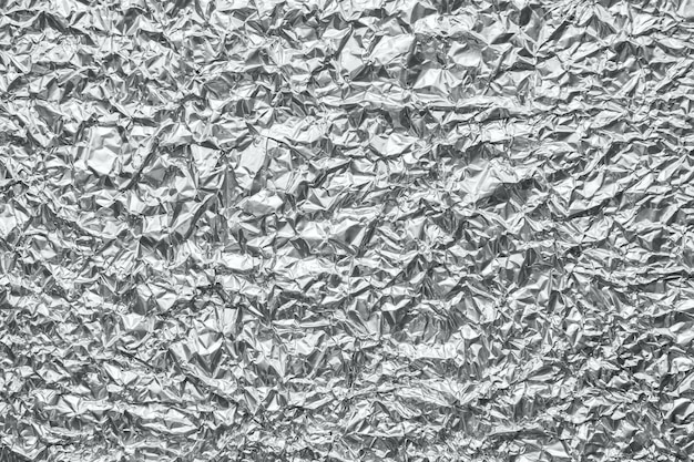 Premium Photo | Shiny metal silver gray foil crumpled texture background