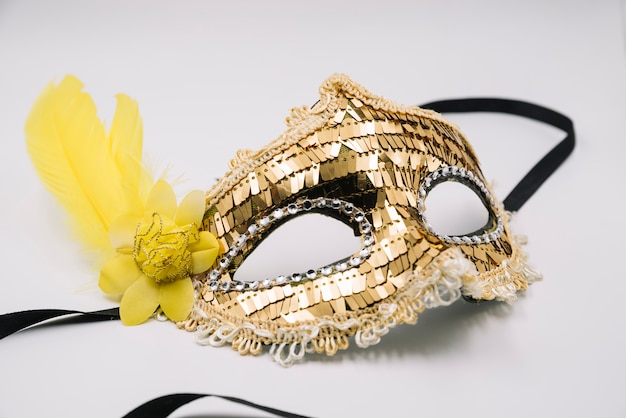 Shiny trendy mask with golden sequins Photo | Free Download