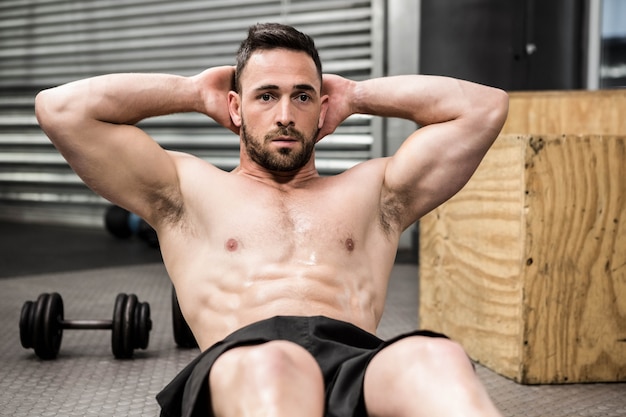 Premium Photo Shirtless Man Doing Abdominal Crunches At The Crossfit Gym