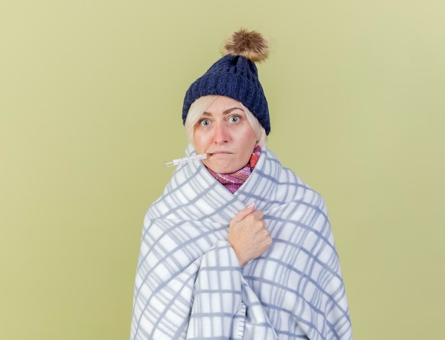 Free Photo | Shocked young blonde ill woman wearing winter hat and ...