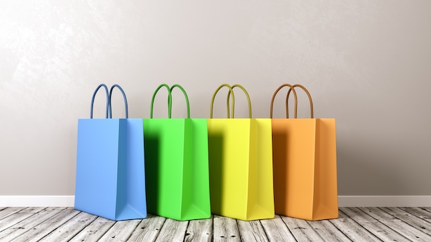 Premium Photo | Shopping bags on wooden floor against wall