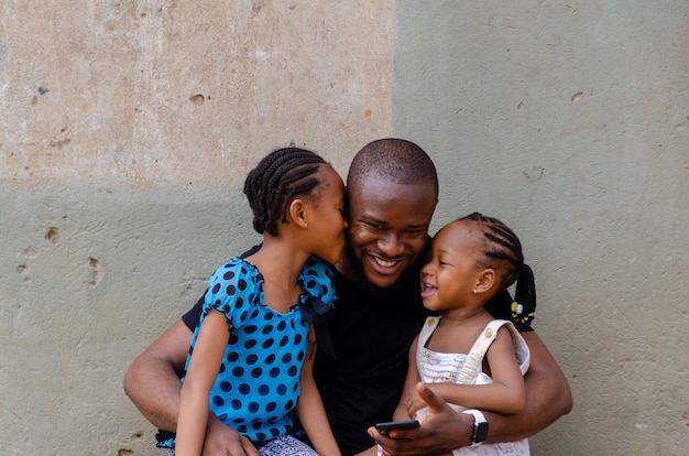 Premium Photo | Shot of an african dad feeling excited as he is bonding ...