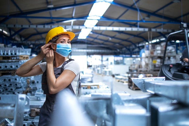 Free Photo | Shot of female factory worker in uniform and hardhat ...