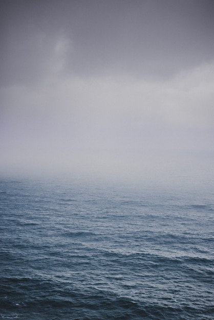 Shot of the ocean on a foggy day | Free Photo