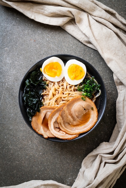 Premium Photo | Shoyu ramen noodle with pork and egg - japanese food style
